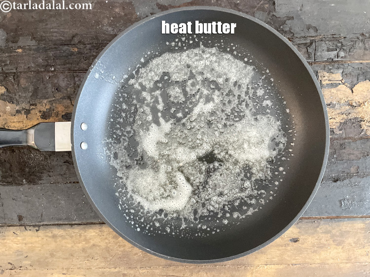 Step 19 – Heat&nbsp;<meta charset="UTF-8" />1 tsp&nbsp;<a href="glossary-butter-makhan-233i">butter</a>&nbsp;<meta charset="UTF-8" />in a broad non-stick pan.