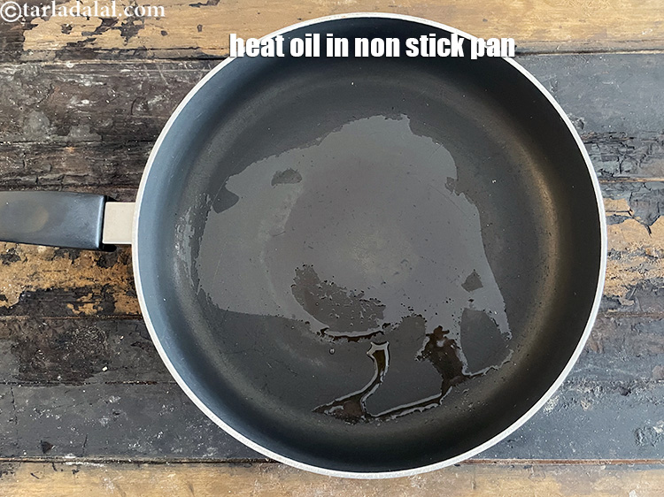 Step 10 – Heat <meta charset="UTF-8" />1 1/2 tsp&nbsp;<a href="glossary-oil-671i">oil</a> in a broad non-stick pan.&nbsp;