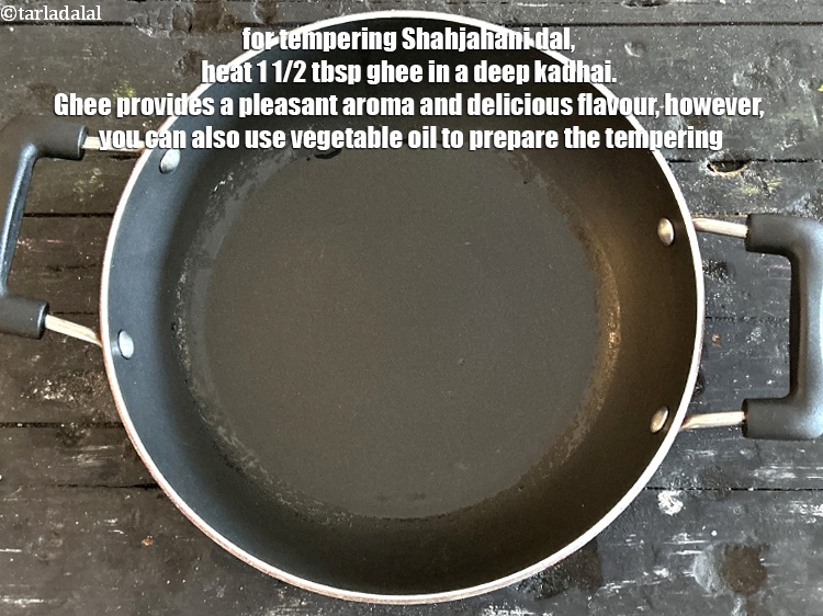 Step 39 – For tempering&nbsp;<strong>Shahjahani dal</strong>, heat&nbsp;1 1/2 tbsp&nbsp;<a href="glossary-ghee-245i">ghee</a>&nbsp;in a deep kadhai. Ghee provides a pleasant aroma …