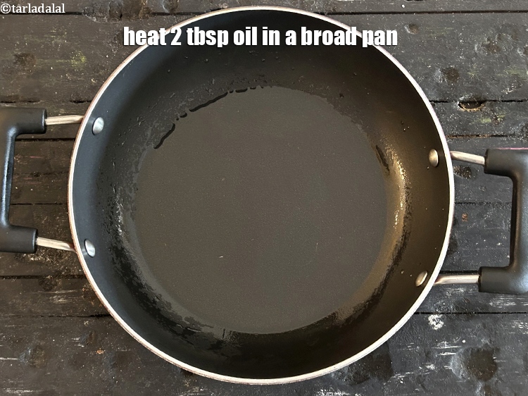 Step 5 – Heat <meta charset="UTF-8" />2 tbsp&nbsp;<a href="glossary-oil-671i">oil</a> in a broad pan,