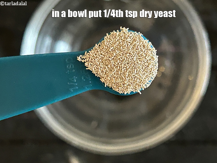 Step 3 – In a bowl put <meta charset="UTF-8" /><strong>1/4th&nbsp;tsp</strong>&nbsp;<a href="glossary-dry-yeast-sukha-khamir-657i">dry yeast</a>.