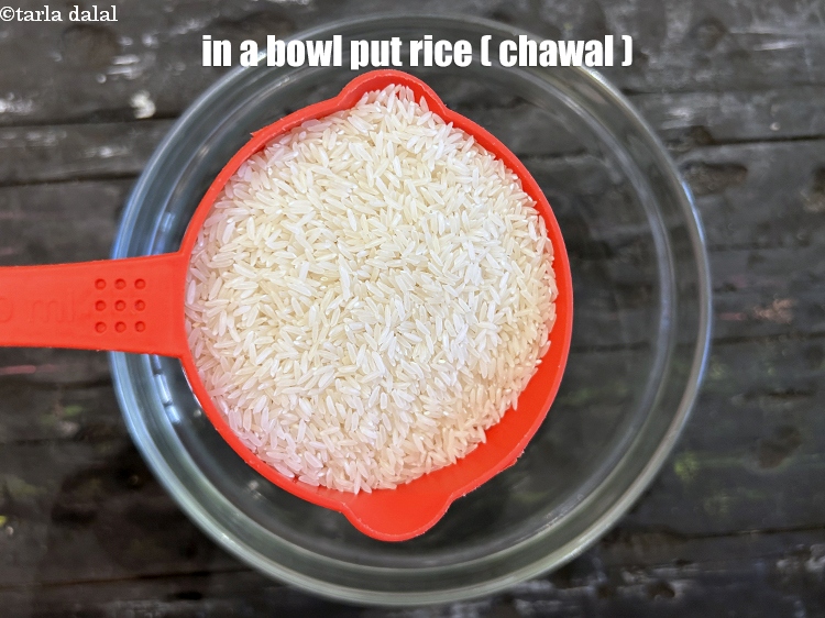 Step 3 – In a bowl put&nbsp;<meta charset="UTF-8" />2 cups&nbsp;raw&nbsp;<a href="glossary-rice-chawal-533i">rice (chawal)</a>.