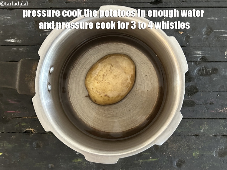 Step 3 – Pressure cook the potato in enough water for 3&nbsp;to 4&nbsp;whistles. Cool and open the lid.