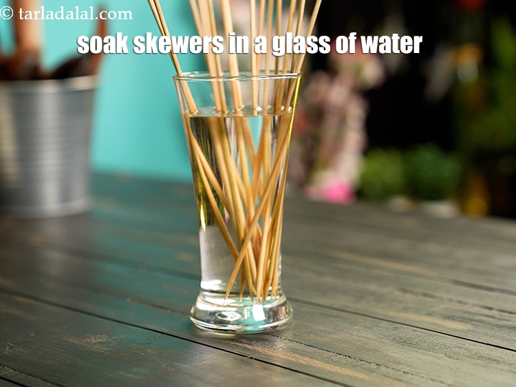 Step 39 – Soak skewers in a glass of water.