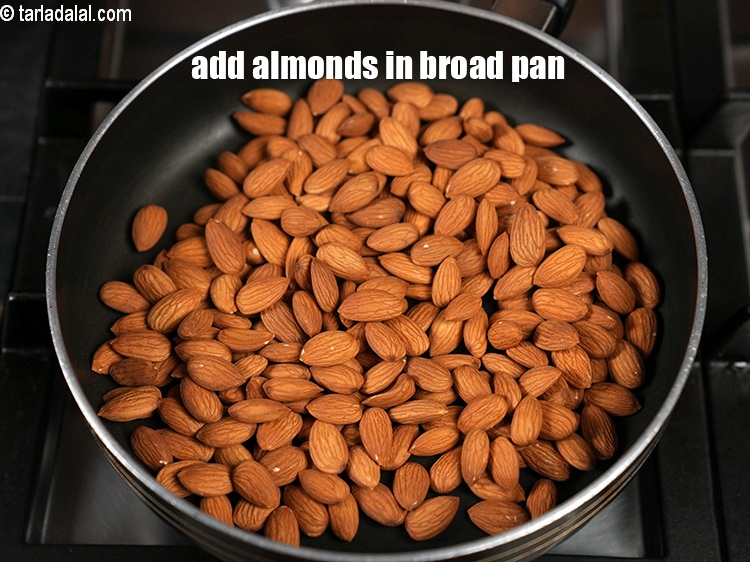 Step 3 – <p>To make <strong>almond butter recipe</strong>, add 2¼ cups <a href="https://www.tarladalal.com/glossary-almonds-badam-378i">almonds (badam)</a> in a broad non-stick …