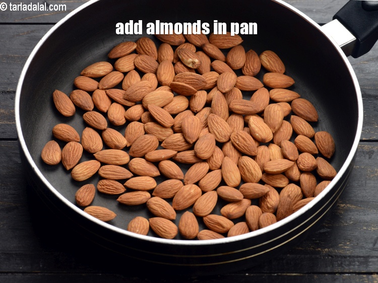 Step 3 – To make <strong>chocolate spread</strong>, add 1 cup <a href="https://www.tarladalal.com/glossary-almonds-badam-378i">almonds (badam)</a>&nbsp;in a non-stick pan.