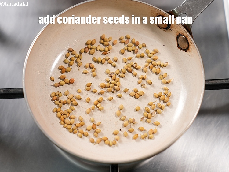 Step 4 – To make <strong>kadhai paneer</strong>, add 1 tsp <a href="https://www.tarladalal.com/glossary-coriander-seeds-dhania-ke-beej-dhania-seeds-akha-dhania-371i">coriander (dhania) seeds</a> in a small pan.