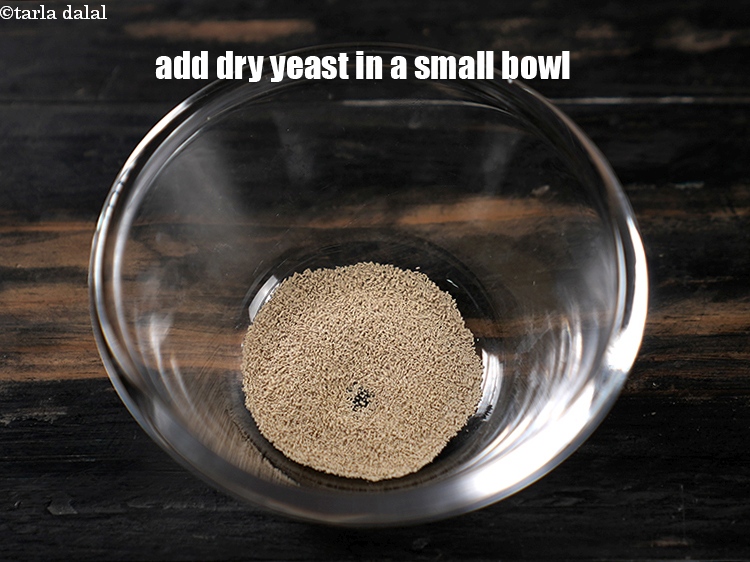 Step 3 – In a small bowl, add &frac12; tsp <a href="https://www.tarladalal.com/glossary-dry-yeast-sukha-khamir-657i">dry yeast</a>.