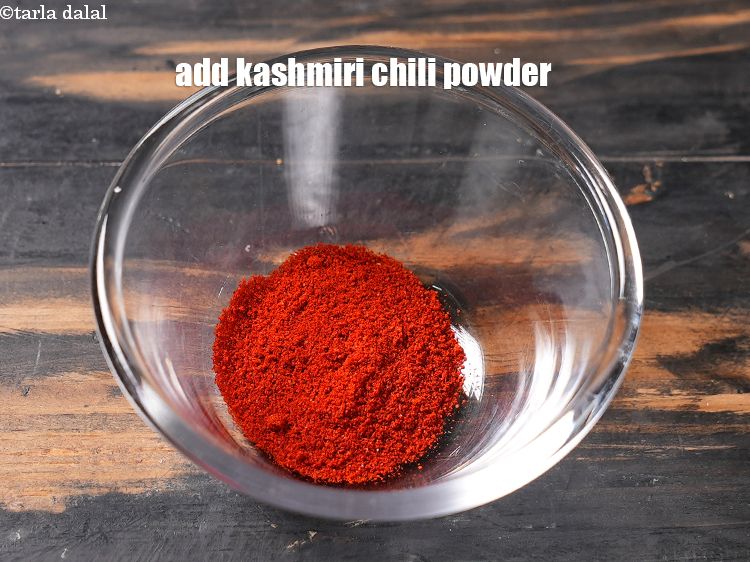 Step 10 – In a small bowl, add &frac12; tbsp Kashmiri red chili powder.<br /> &nbsp;