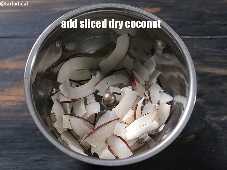 Step 3 – <strong>how to make green masala paste</strong> In a mixer jar add&nbsp;1/4 cup sliced dry coconut …