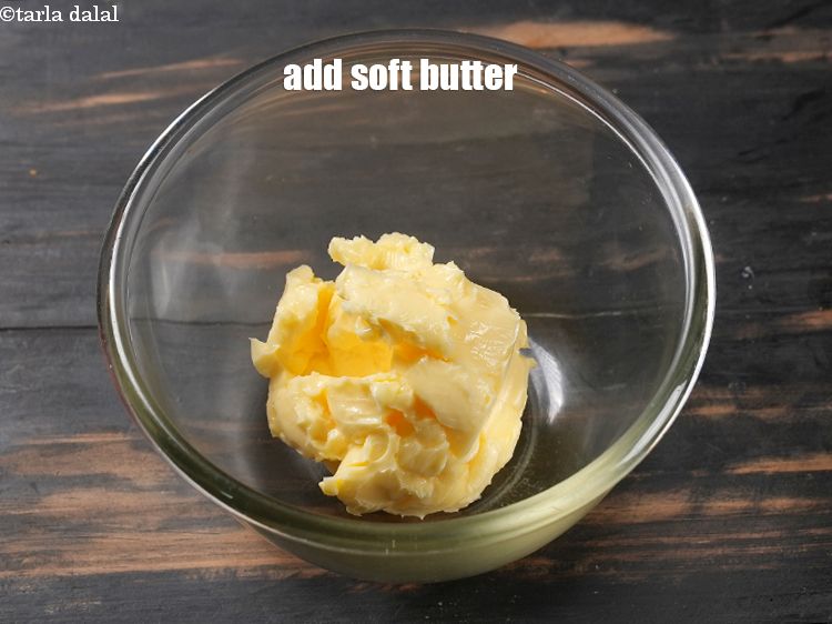 Step 3 – In a deep bowl, add 6 tbsp soft butter.