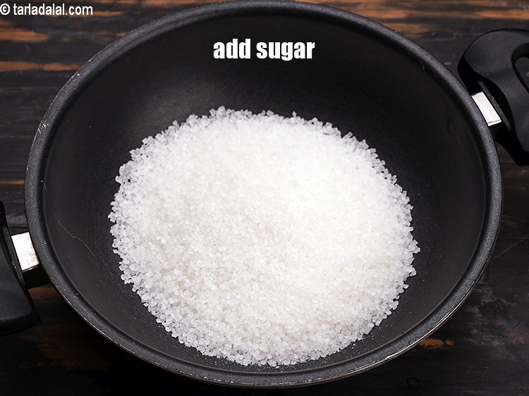 Step 4 – To make <strong>instant gulab jamun</strong>, add 1 1/2&nbsp;cups&nbsp;<a href="https://www.tarladalal.com/glossary-sugar-chini-shakkar-278i">sugar</a>.