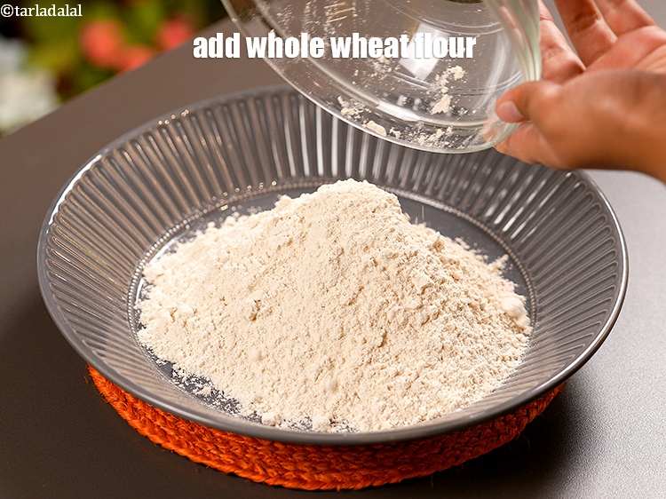 Step 3 – To make <strong>cucumber roti</strong>, add 1 1/2 cups <a href="https://www.tarladalal.com/glossary-whole-wheat-flour-gehun-ka-atta-gehun-ka-aata-429i">whole wheat flour (gehun ka atta)</a>&nbsp;in …