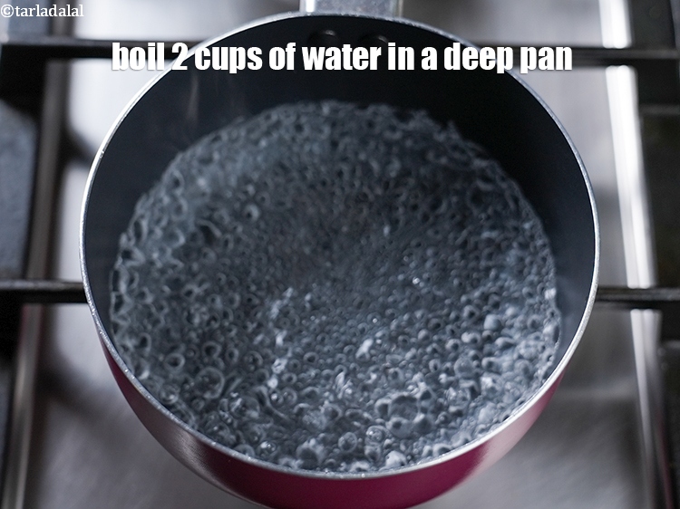 Step 3 – To make <strong>ginger tulsi detox water</strong>, boil 2 cups of water in a deep pan.