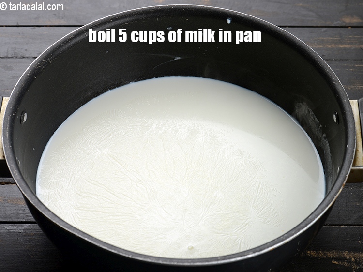Step 3 – To make cream cheese, boil 5 cups of milk in a deep pan.