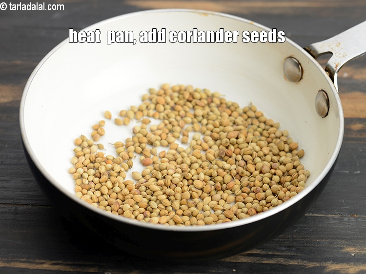 Step 4 – Heat a small non-stick pan, add 2 tbsp <a href="https://www.tarladalal.com/glossary-coriander-seeds-dhania-ke-beej-dhania-seeds-akha-dhania-371i">coriander (dhania) seeds</a>.