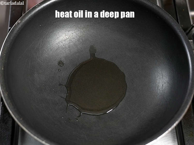 Step 3 – To make <strong>vegetable and bean soup</strong>, heat 2 tsp oil in a deep pan.