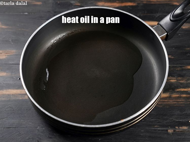 Step 3 – Heat 2 tbsp oil in a small broad non-stick pan.