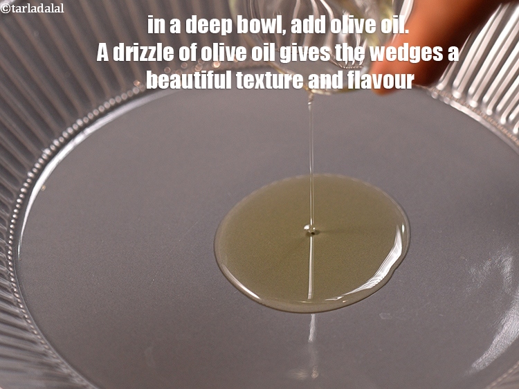 स्टेप 23 – १ टेबल-स्पून&nbsp;<a href=""https://www.tarladalal.com/glossary-olive-oil-hindi-451i"">जैतून का तेल</a>&nbsp;डालें । जैतून के तेल&nbsp;वेजेज को …