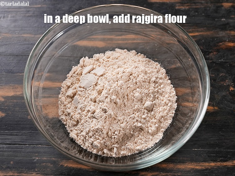 Step 3 – To make <strong>rajgira methi thalipeeth</strong>, in a deep bowl, add 1 cup&nbsp;<a href="https://www.tarladalal.com/glossary-rajgira-flour-ramadana-flour-amaranth-flour-rajgira-ka-atta-1297i">rajgira (amaranth) flour</a>.&nbsp;