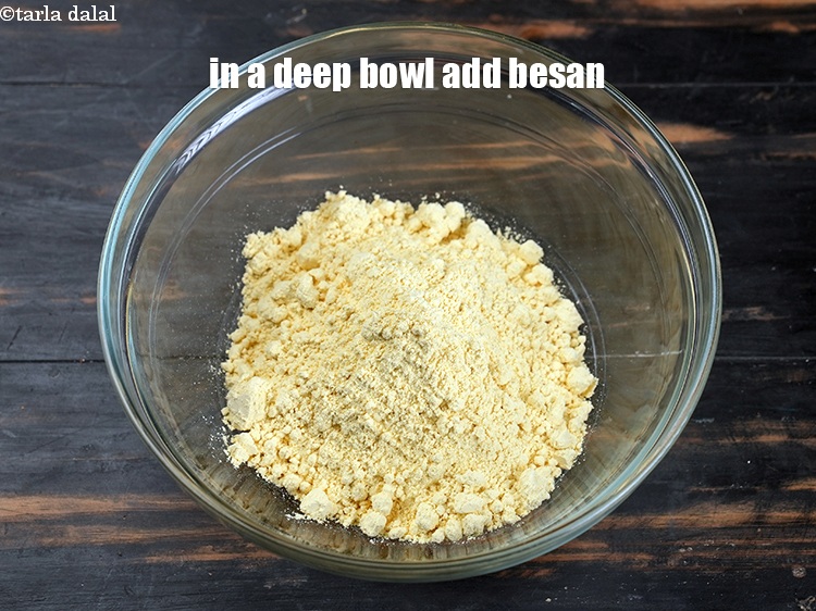Step 3 – To make <strong>raw banana fritters,</strong> in a deep bowl add, 3/4 cup <a href="https://www.tarladalal.com/glossary-besan-chana-dal-flour-bengal-gram-flour-952i">besan (bengal …