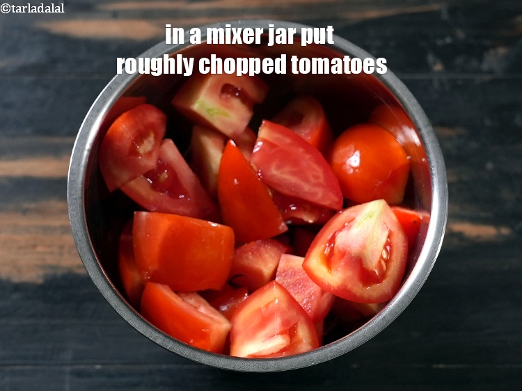 Step 3 – In a mixer jar, add 1&frac12; cups roughly <a href="https://www.tarladalal.com/glossary-chopped-tomatoes-779i">chopped tomatoes</a>.