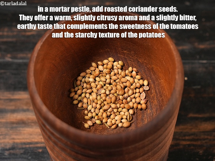 Step 3 – In a mortar pestle, add 1 tsp roasted <a href="https://www.tarladalal.com/glossary-coriander-seeds-dhania-ke-beej-dhania-seeds-akha-dhania-371i">coriander (dhania) seeds</a>. They offer a …