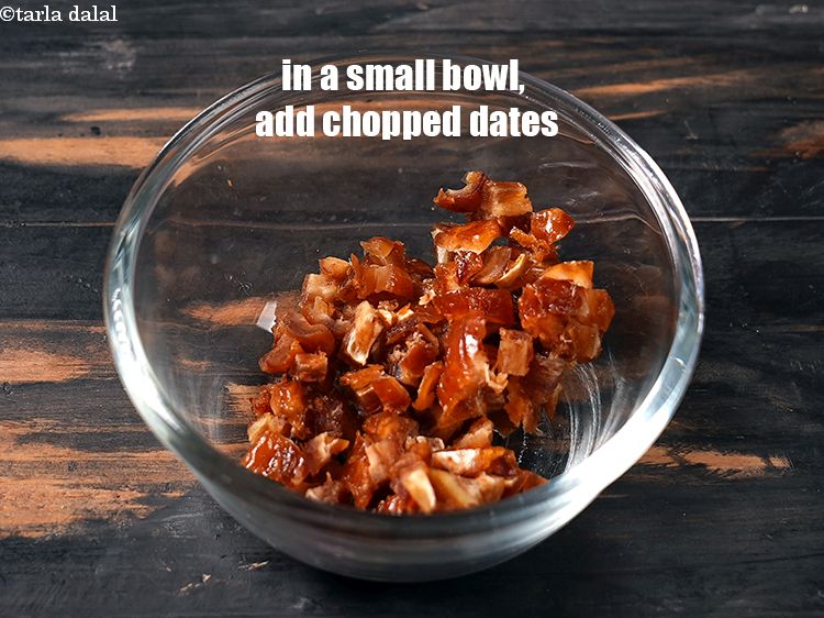 Step 3 – To make <strong>eggless whole wheat cake</strong>, in a small bowl, add 1/3 cup <a href="https://www.tarladalal.com/glossary-chopped-dates-801i">chopped …