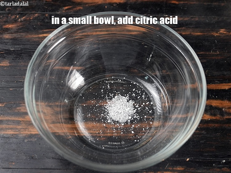 Step 3 – In a small bowl, add 1/4 tsp of <a href="https://tarladalal.com/glossary-citric-acid-nimbu-ka-phool-347i">citric acid (nimbu ka phool)</a>.&nbsp;Citric acid …