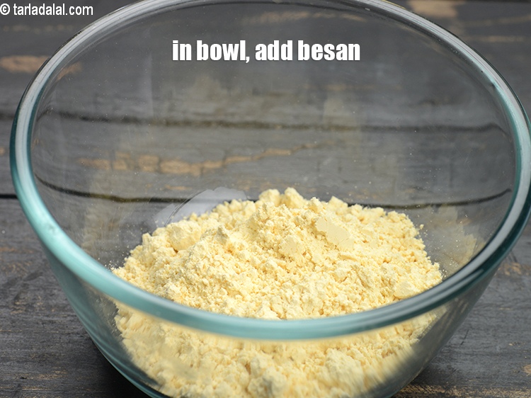Step 4 – In a deep bowl, add &frac12; cup <a href="https://www.tarladalal.com/glossary-besan-chana-dal-flour-bengal-gram-flour-952i">besan (bengal gram flour)</a>.&nbsp;