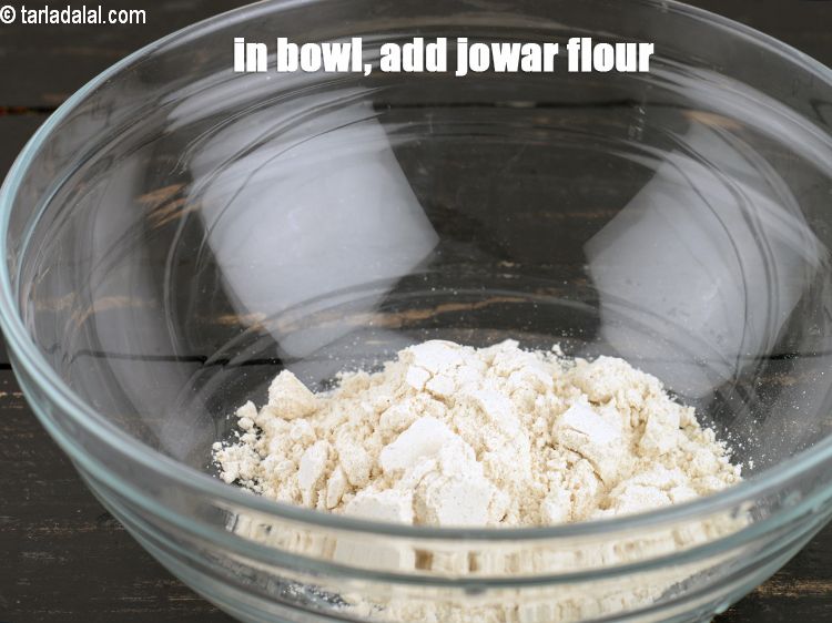 Step 3 – To make<strong> jowar bajra thalipeeth</strong>, In a deep bowl, add 1/4 cup <a href="https://www.tarladalal.com/glossary-jowar-flour-jowar-ka-atta-white-millet-flour-sorghum-flour-483i">jowar (white …
