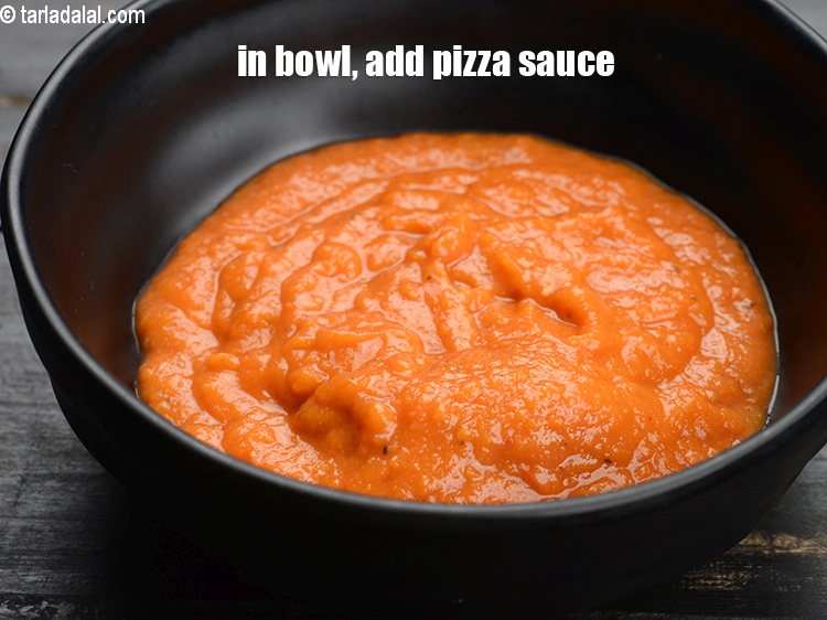 Step 3 – In a deep bowl, add 3/4 cup&nbsp;<a href="https://www.tarladalal.com/glossary-pizza-sauce-1889i">pizza sauce</a>.
