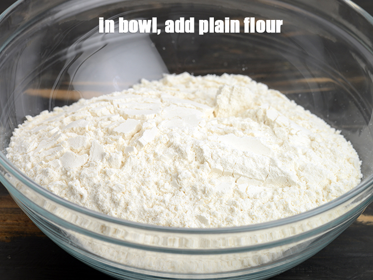 Step 3 – In a deep bowl, add 2 cups <a href="https://www.tarladalal.com/glossary-plain-flour-maida-188i">plain flour (maida)</a>.