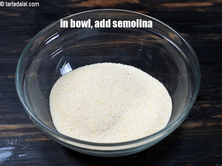 Step 4 – To make <strong>instant suji handvo</strong>, in a deep bowl, add 1 cup <a href="https://www.tarladalal.com/glossary-semolina-sooji-rava-rawa-603i">semolina (rava …