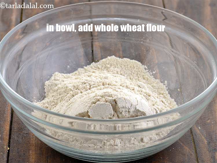 Step 3 – In a deep bowl, add 1 cup <a href="https://www.tarladalal.com/glossary-whole-wheat-flour-gehun-ka-atta-gehun-ka-aata-429i">whole wheat flour (gehun ka atta)</a>.