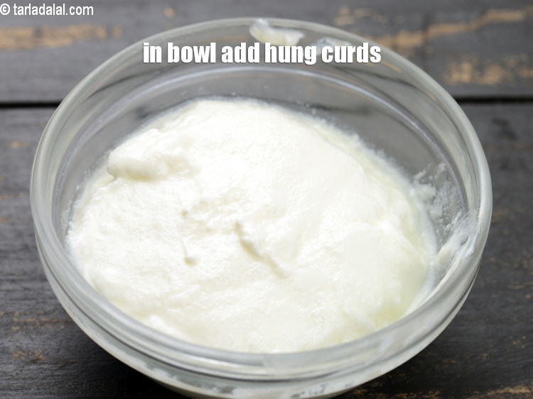 Step 3 – To make <strong>mishit doi</strong>, in a small bowl add 3 tbsp&nbsp;<a href="https://www.tarladalal.com/glossary-hung-curds-chakka-dahi-384i">hung curds (chakka dahi)</a>.