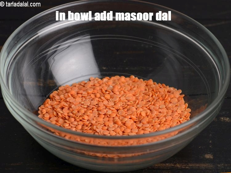 Step 3 – In a deep bowl add &frac12; cup <a href="https://www.tarladalal.com/glossary-masoor-dal-split-red-lentil-masoor-ki-dal-303i">masoor dal (split red lentil)</a>.