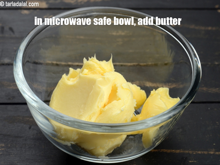 Step 3 – In a microwave safe bowl, add &frac12; cup <a href="https://www.tarladalal.com/glossary-butter-makhan-233i">butter</a>.