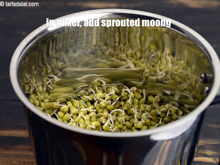 Step 3 – In a mixer, add 1 &frac14; cups &nbsp;<a href="https://www.tarladalal.com/glossary-sprouted-moong-moong-sprouts-988i">sprouted moong (whole green gram)</a>.