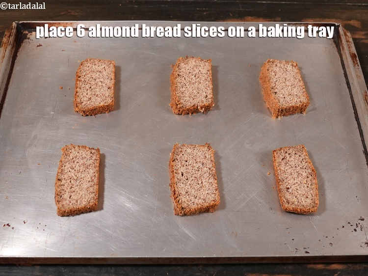 Step 5 – Place 6&nbsp;almond bread slices on a baking tray.