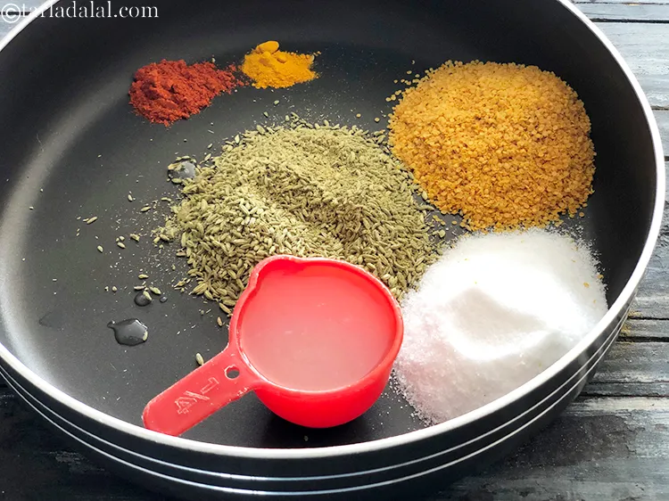 Step 11 – Add 3 tablespoons lemon juice. This will help to bind the masala well.