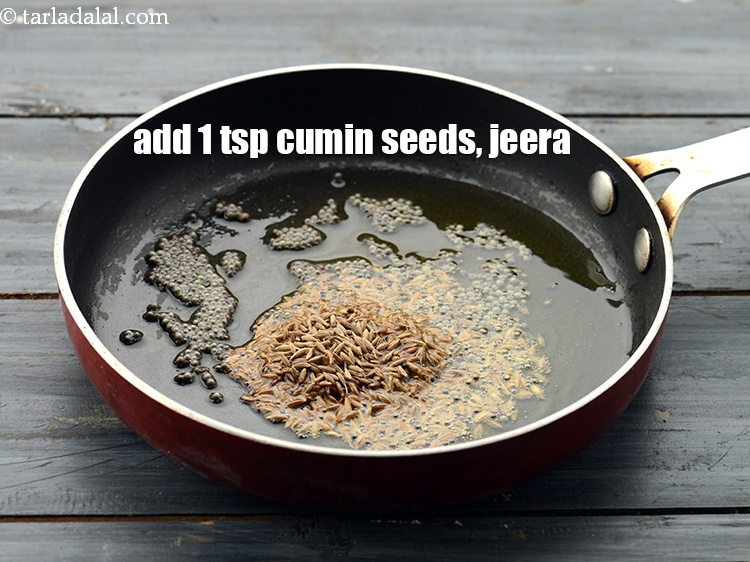 Step 20 – When the seeds crackle, add the1 tsp&nbsp;<a href="https://www.tarladalal.com/glossary-cumin-seeds-jeera-zeera-381i">cumin seeds (jeera)</a>.