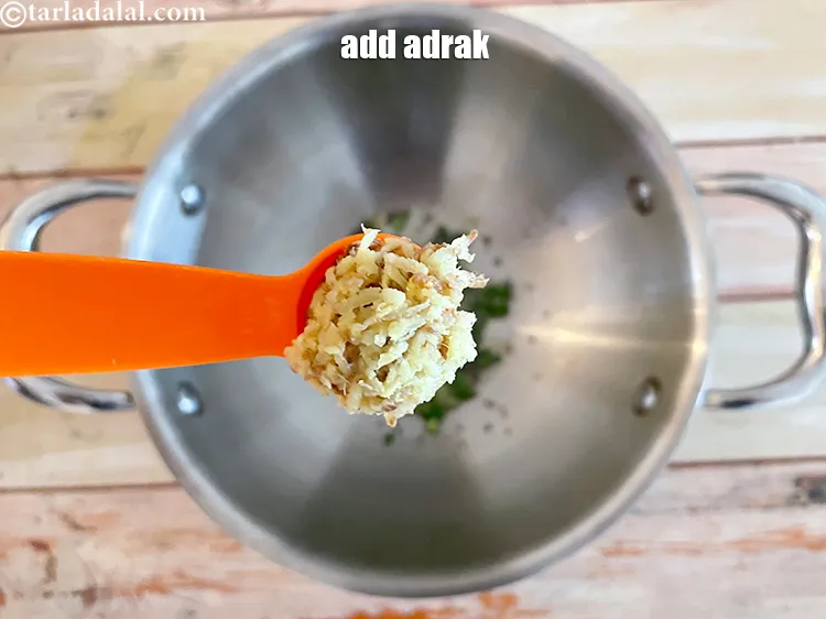 स्टेप 12 – १ टी-स्पून बारीक <a href=""https://www.tarladalal.com/glossary-chopped-ginger-hindi-786i"">कटा हुआ अदरक</a> डालें। आप चाहें …