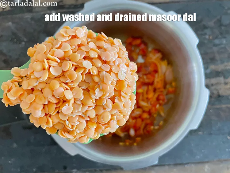 Step 19 – Add&nbsp;<meta charset="UTF-8" />1/2 cup&nbsp;<a href="glossary-masoor-dal-split-red-lentil-masoor-ki-dal-303i">masoor dal (split red lentil)</a>&nbsp;, washed and drained. See above on …