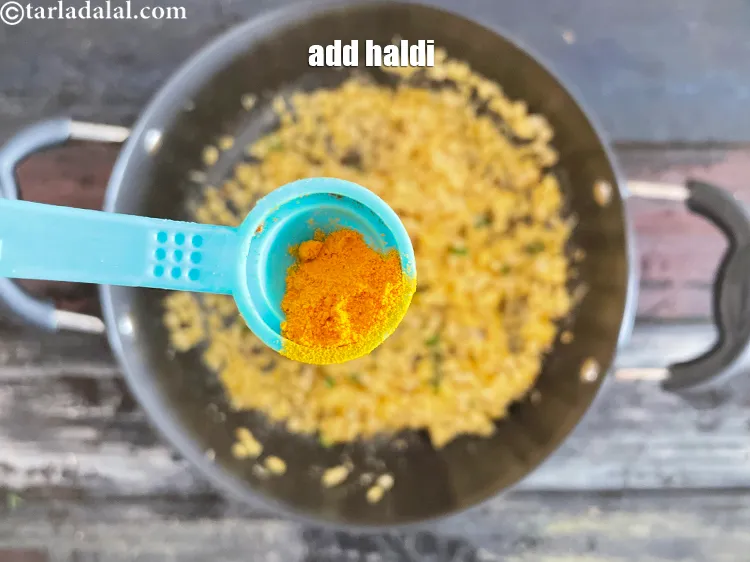 Step 22 – Add&nbsp;<meta charset="UTF-8" />1/4 tsp&nbsp;<a href="glossary-turmeric-powder-haldi-645i">turmeric powder (haldi)</a>.