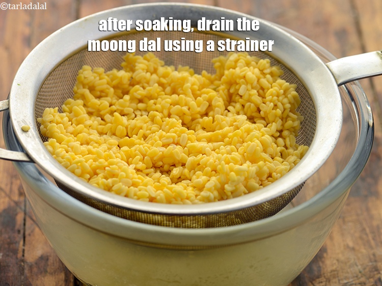 Step 11 – After soaking, drain the moong dal using a strainer.