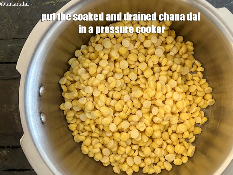 Step 12 – Put the soaked and drained chana dal in a pressure cooker.