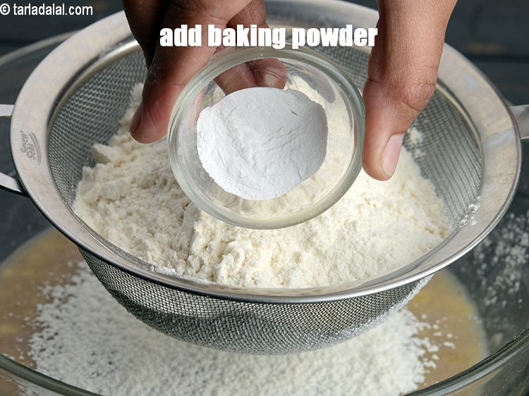 Step 12 – Add 1 tsp <a href="https://www.tarladalal.com/glossary-baking-powder-425i">baking powder</a>.