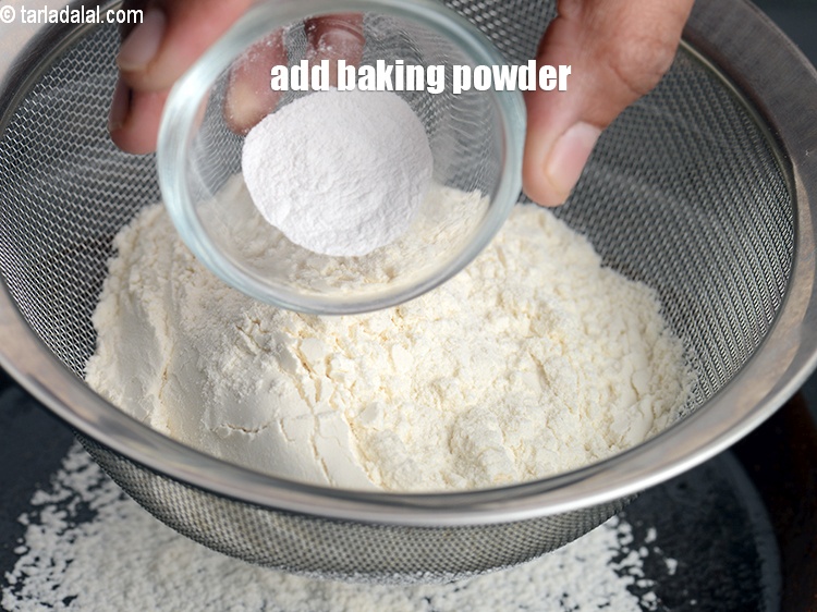 Step 13 – Add &frac14; tsp <a href="https://www.tarladalal.com/glossary-baking-powder-425i">baking powder</a>.