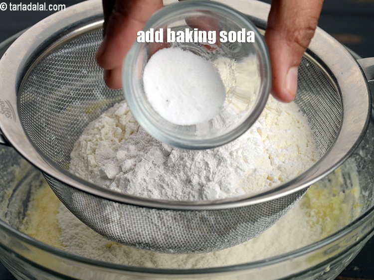Step 14 – Add &frac12; tsp&nbsp;<a href="https://www.tarladalal.com/glossary-baking-soda-soda-bi-carb-615i">baking soda</a>.